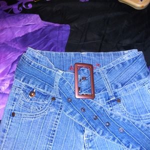 Dress denim pants with belt.